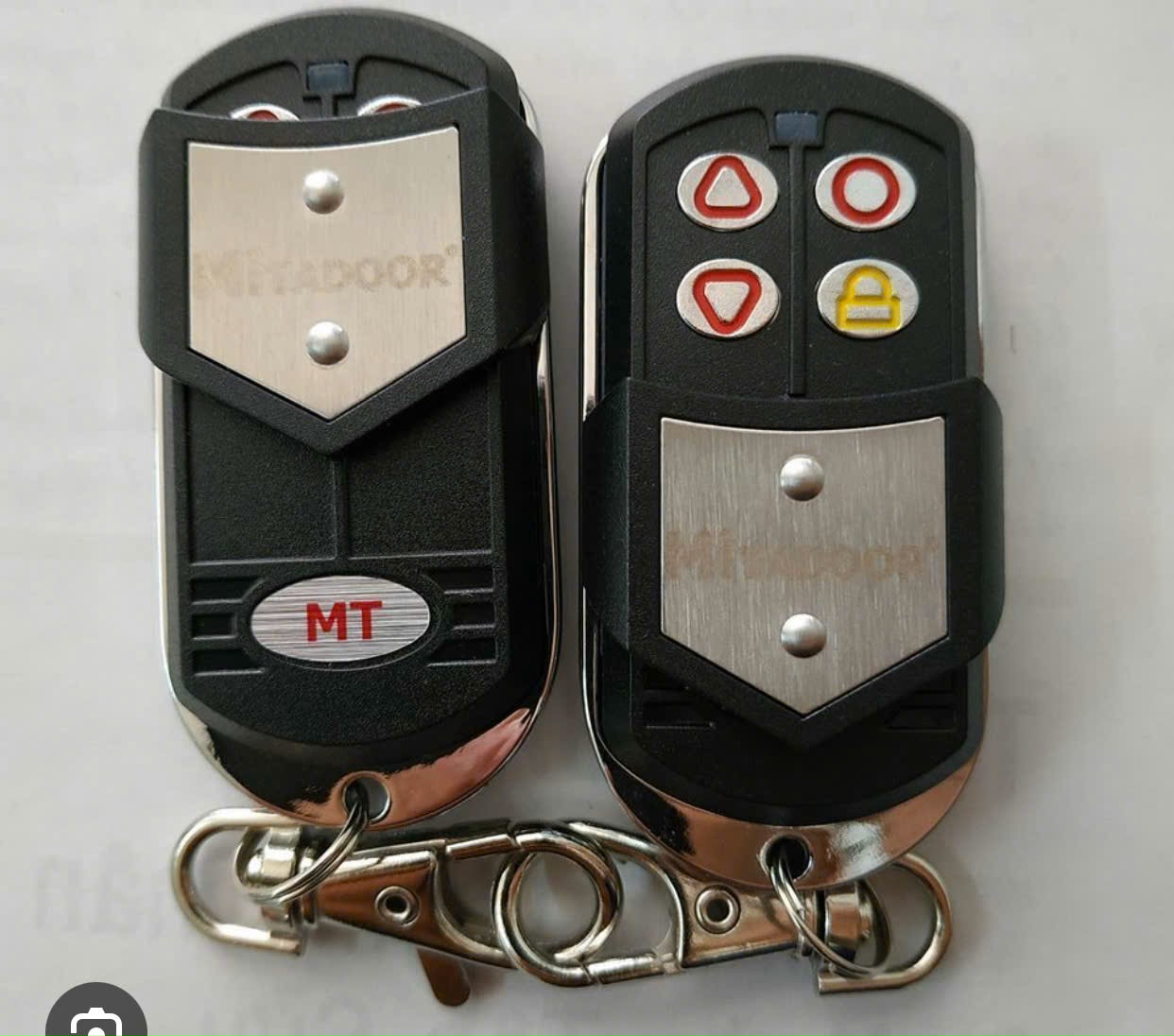Chìa khóa cửa cuốn Mitadoor